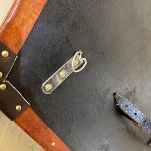 Leather-covered plywood templar shield with cross motif; crusader shield style, riveted edge for wall decor and medieval cosplay.