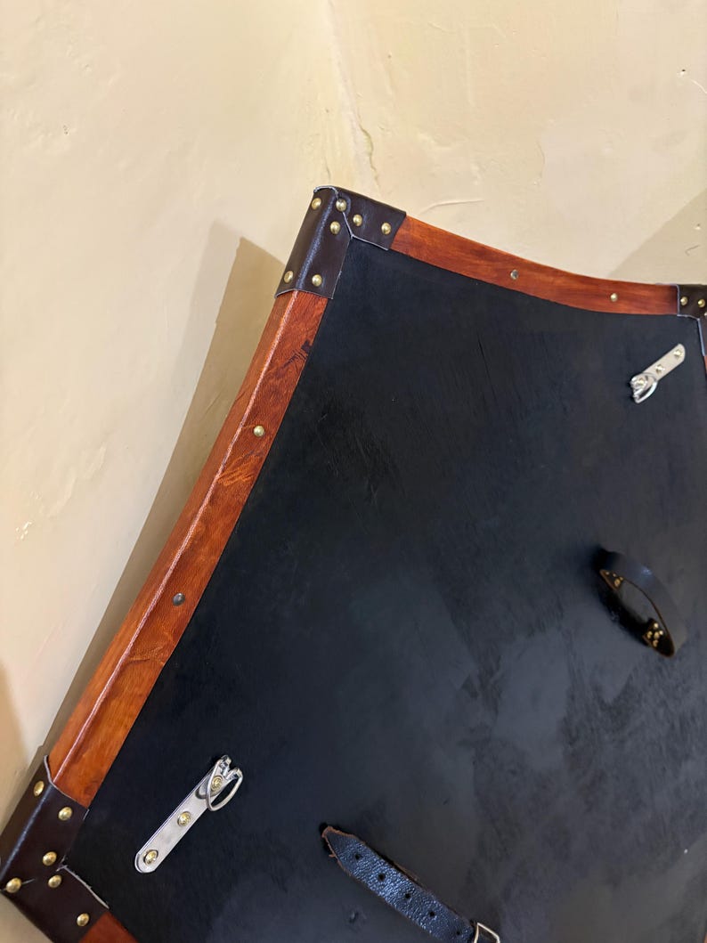Leather-covered plywood templar shield with cross motif; crusader shield style, riveted edge for wall decor and medieval cosplay.
