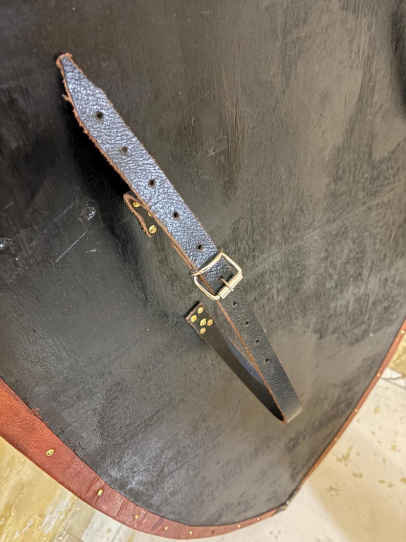 Leather-covered plywood templar shield with cross motif; crusader shield style, riveted edge for wall decor and medieval cosplay.
