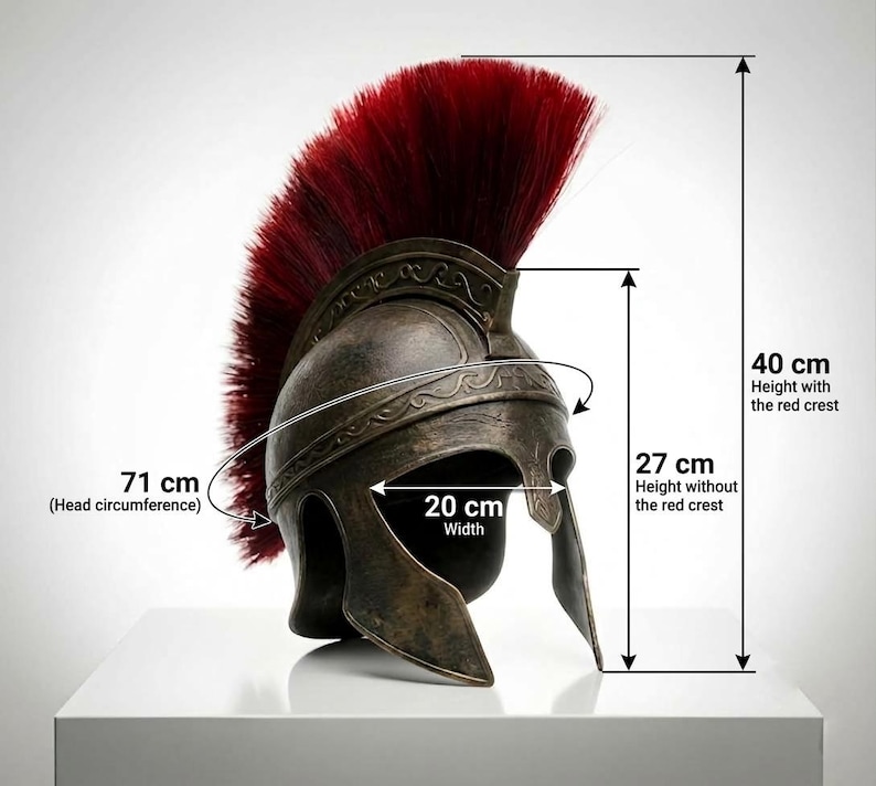 May include: A bronze-colored helmet with a tall red crest. The helmet features engraved scrollwork along the brow. Dimensions are 40 cm in total height, 27 cm in height without the crest, 20 cm in width, and 71 cm in head circumference.