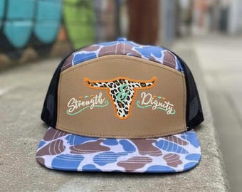 Strength & Dignity Camo Trucker Hat | Inspirational Longhorn Cow Graphic | Faith-Based Cap | Motivational Western Style Hat