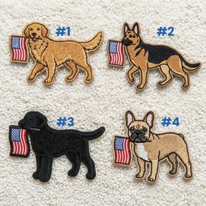 May include: Embroidered patches featuring four different dog breeds: a golden retriever, a German shepherd, a black Labrador, and a French bulldog. Each dog is depicted carrying a small American flag in its mouth. The patches are numbered #1 through #4.