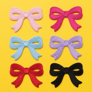 May include: Six embroidered bow patches in shades of pink, blue, purple, red, and black, set against a yellow backdrop. Each bow is intricately stitched. These patches are suitable for embellishing garments or craft projects, adding a touch of flair.
