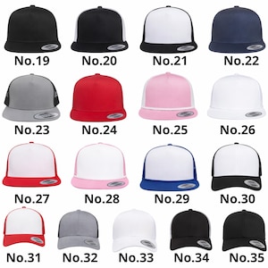 May include: A collection of flat-brimmed baseball caps in various colors, including black, white, red, pink, and navy blue. Each cap features a mesh back and a snapback closure. The numbers 19 through 35 are printed below each cap.