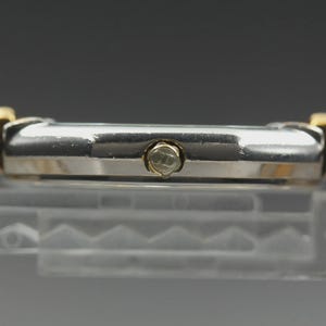 Nahezu neuwertige Vintage Christian Dior D45-204 24mm Damenuhr mit Datumsanzeige und goldenem Zifferblatt, hergestellt in Japan Bild 6