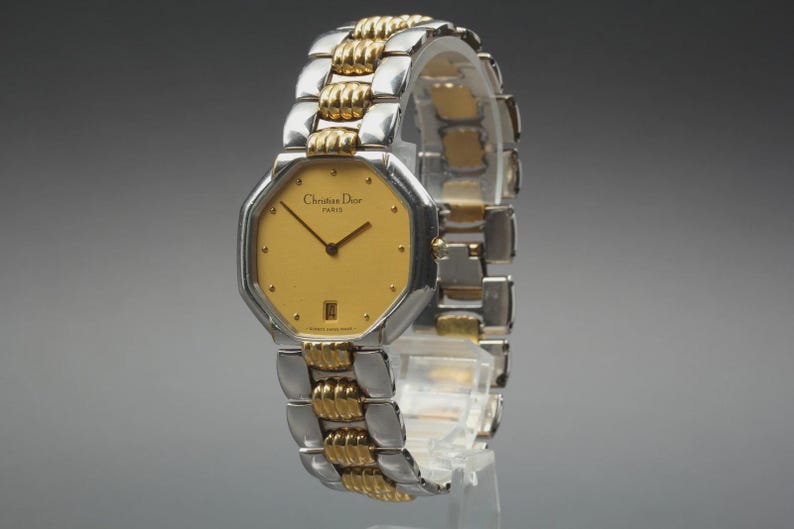 Nahezu neuwertige Vintage Christian Dior D45-204 24mm Damenuhr mit Datumsanzeige und goldenem Zifferblatt, hergestellt in Japan Bild 4