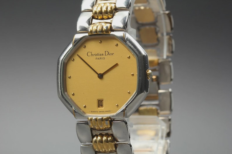Nahezu neuwertige Vintage Christian Dior D45-204 24mm Damenuhr mit Datumsanzeige und goldenem Zifferblatt, hergestellt in Japan Bild 2