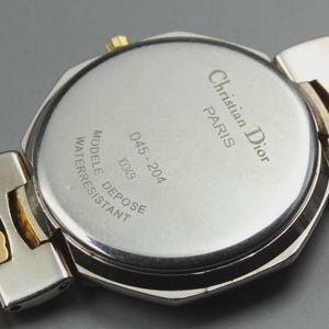 Nahezu neuwertige Vintage Christian Dior D45-204 24mm Damenuhr mit Datumsanzeige und goldenem Zifferblatt, hergestellt in Japan Bild 3
