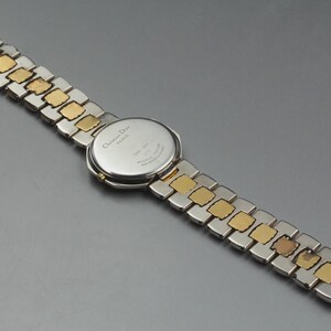 Nahezu neuwertige Vintage Christian Dior D45-204 24mm Damenuhr mit Datumsanzeige und goldenem Zifferblatt, hergestellt in Japan Bild 8