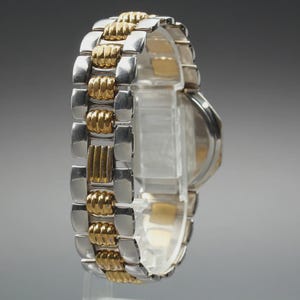 Nahezu neuwertige Vintage Christian Dior D45-204 24mm Damenuhr mit Datumsanzeige und goldenem Zifferblatt, hergestellt in Japan Bild 5