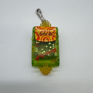 Vintage Sony SRF-FQ9 Clip-On AM/FM Radio (1990s) – Transparent Green