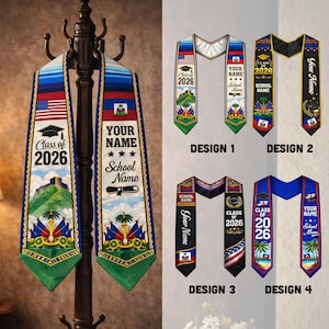 May include: Graduation stoles with various designs. Two stoles are displayed on a coat rack, featuring the text "Class of 2026", the American flag, and the Haitian flag. Additional designs include space for a name and school name.
