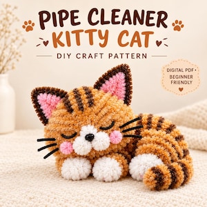 May include: A brown and tan striped cat figure made from pipe cleaners with pink inner ears, white paws, and a white muzzle. The text reads: PIPE CLEANER KITTY CAT DIY CRAFT PATTERN and DIGITAL PDF BEGINNER FRIENDLY. The cat has closed eyes and black whiskers.