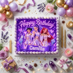 May include: A square birthday cake with white frosting borders, featuring a purple graphic of three figures in matching outfits, the text Happy Birthday and Camille, and the number 5. The cake is surrounded by balloons, flowers, and crystals.