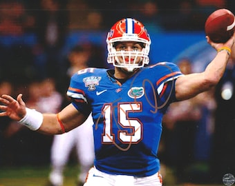 Tim Tebow Signed Autographed Florida Gators Heisman Trophy 8x10 Photo with COA