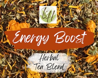 May include: Close-up of a herbal tea blend with orange and green elements. The text "Energy Boost" is displayed on a rust-colored banner, with "Herbal Tea Blend" below it. A logo is in the upper left corner.
