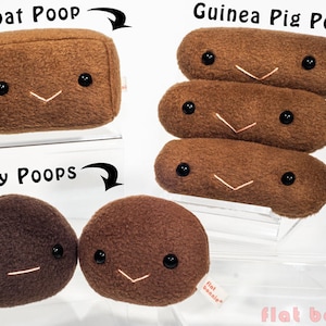 May include: Three plush toys shaped like animal poop. The first is a brown rectangular "Wombat Poop" with a smiling face. The second is a stack of three brown cylindrical "Guinea Pig Poop" with smiling faces. The third is two brown round "Bunny Poops" with smiling faces. All toys have a "flat bonnie" tag.