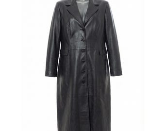 May include: A long, black leather coat with a notched collar, button closure, and two front pockets. The coat is displayed on a mannequin against a white background. The coat appears to be knee-length.