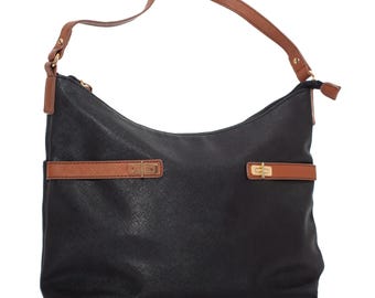 May include: Black shoulder bag with brown accents. The bag features a textured surface, a brown shoulder strap, and brown straps with gold-colored clasps. The bag has a curved top and a single strap.