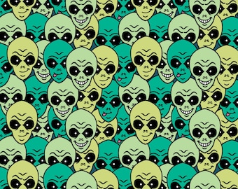 I Want to Believe - Extra Terrestrials Alien Heads Green from Camelot Fabrics