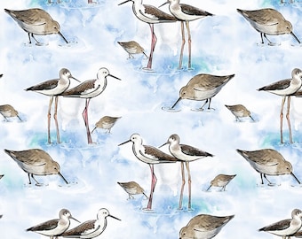May include: A watercolor pattern featuring a repeating design of stylized black and white birds with long legs standing in a blue and white watercolor background.