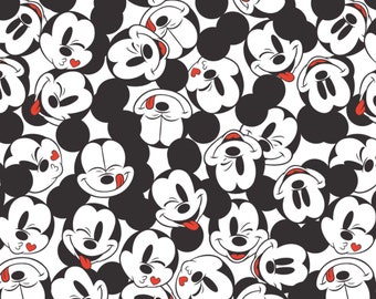 Mickey Mouse - Tossed Stack Mickey White from Camelot Fabrics