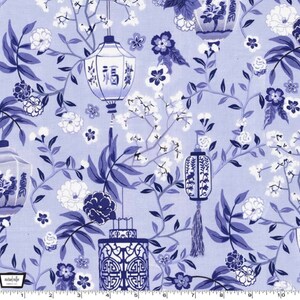 May include: Blue and white floral fabric with a repeating pattern of lanterns and cherry blossoms. The lanterns are decorated with Chinese characters.
