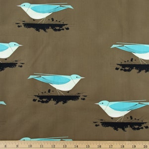 May include: A brown fabric with a repeating pattern of blue stylized birds perched on black branches. The birds have white bellies and are outlined in black.