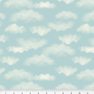 May include: A light blue fabric with a repeating pattern of fluffy white clouds. The clouds have soft edges and a watercolor effect, creating a dreamy, sky-like appearance. The fabric is suitable for various craft projects.