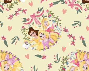 May include: A yellow background with a floral pattern and three Disney princesses: Belle, Rapunzel, and Aurora. The princesses are surrounded by flowers and vines.