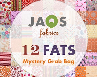 May include: A white circle with a pink border and the text "JAQS fabrics" in green and gray. Below the text is "12 FATS Mystery Grab Bag" in brown and purple text. The circle is surrounded by a collage of colorful fabric squares with various patterns.