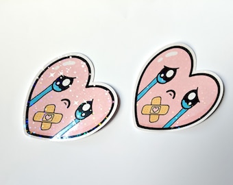Pegatina Kawaii de Corazón Llorando – Vinilo Holográfico Pastel, Brillo Arcoíris