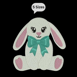 May include: An embroidered bunny design with a teal bow, pink inner ears, and pink paw pads. The bunny has large eyes with eyelashes and the text "5 Sizes" in a speech bubble.