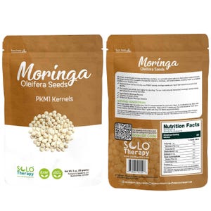 May include: A brown package of Moringa Oleifera Seeds, PKM1 Kernels, with the Solo Therapy logo. The front displays the product name and a pile of seeds. The back includes nutritional information and text about the product.
