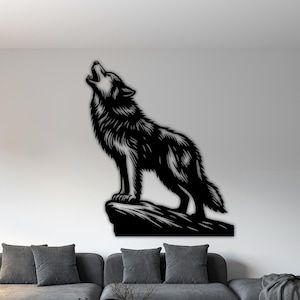 May include: Black metal wall art depicting a howling wolf standing on a rock. The wolf is highly detailed with a textured fur design. The artwork is mounted on a white wall above a gray sofa in a modern living room setting.