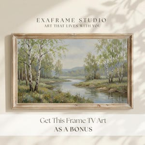A serene bonus artwork showcasing a tranquil birch forest river landscape framed in rustic weathered wood, displayed on a clean neutral wall with soft window shadows. This complementary piece included in every order features gentle impressionist tree textures and a peaceful water stream. Designed to complete your seasonal screen collection with sophisticated country charm. Click to access your instant digital download files.