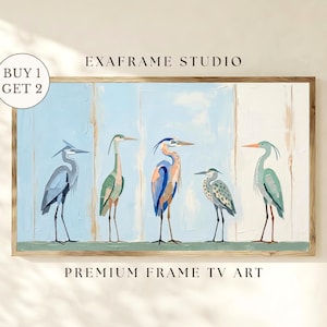 May include: A framed artwork featuring five stylized herons in shades of blue, green, and orange against a light blue and white background. The artwork is labeled "EXAFRAME STUDIO" and "PREMIUM FRAME TV ART".