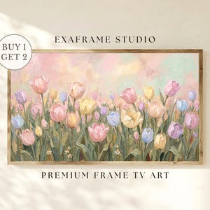 Peut inclure: Tableau encadré de tulipes aux couleurs pastel, roses, jaunes et bleues. L'œuvre est signée "EXAFRAME STUDIO" et "PREMIUM FRAME TV ART". Un graphique circulaire indique "BUY 1 GET 2". Le tableau est dans un cadre en bois.