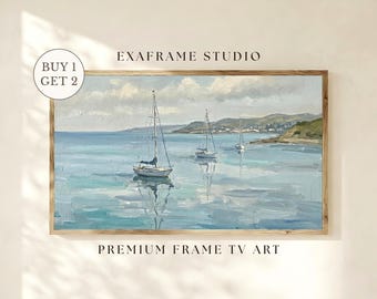 May include: Oil painting of sailboats on a turquoise sea, framed in a light brown wooden frame. The artwork features three sailboats, with a coastal landscape in the background. Text on the image reads "EXAFRAME STUDIO" and "PREMIUM FRAME TV ART".