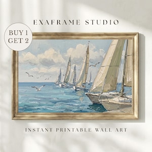 May include: A framed painting of sailboats on the water under a cloudy sky. The artwork features several white sailboats with their sails up, sailing on blue water. The frame is gold. Text on the image reads "EXAFRAME STUDIO" and "INSTANT PRINTABLE WALL ART."