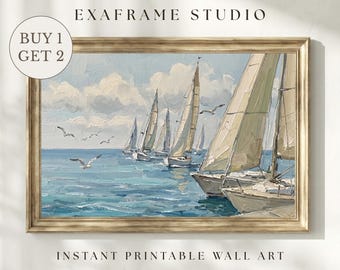 May include: A framed painting of sailboats on the water under a cloudy sky. The artwork features several white sailboats with their sails up, sailing on blue water. The frame is gold. Text on the image reads "EXAFRAME STUDIO" and "INSTANT PRINTABLE WALL ART."