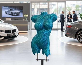A sculpture of a female torso made from steel nuts, a figurine on a Tiffany-colored stand, a mannequin for a clothing store or atelier