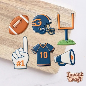 May include: A set of three ceramic mugs with a speckled, matte finish. Each mug features a different color: light blue, cream, and gray. The mugs have a simple, modern design and a comfortable handle.