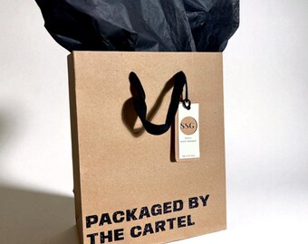 Funny Gift Bag | "Packaged by the Cartel" | Reusable Glitter Kraft Gift Bag with Tissue Included | Eco Friendly
