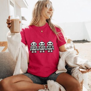 K&ouml;nnte beinhalten: Ein Set aus drei Keramikbechern mit gesprenkelter, matter Oberfl&auml;che. Die Becher sind in Creme-, Hellgrau- und Dunkelgraut&ouml;nen gehalten. Jeder Becher hat ein schlichtes, minimalistisches Design.