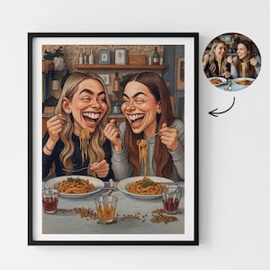 May include: A framed cartoon print depicts two laughing women enjoying spaghetti. The artwork features a restaurant setting with plates of pasta, glasses of red and amber liquid, and a small inset image of the same scene. The print is in a black frame.