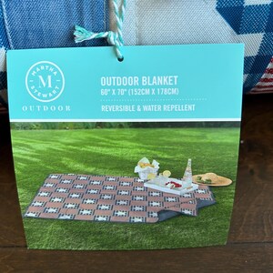 May include: A set of three ceramic mugs with a speckled, matte finish. The mugs are in shades of cream, light gray, and dark gray. Each mug has a simple, minimalist design, perfect for coffee or tea.