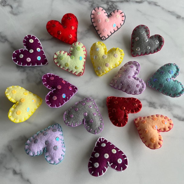 Small heart brooches, pretty, unique, handsewn. Padded felt, decorated with sequins. For coats, hats, scarves. Gift idea. Stocking filler.