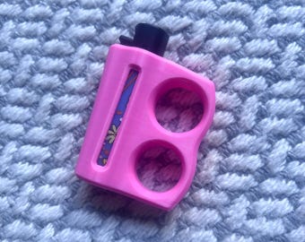 Accessorio rosa per accendino Clipper per autodifesa | Tirapugni