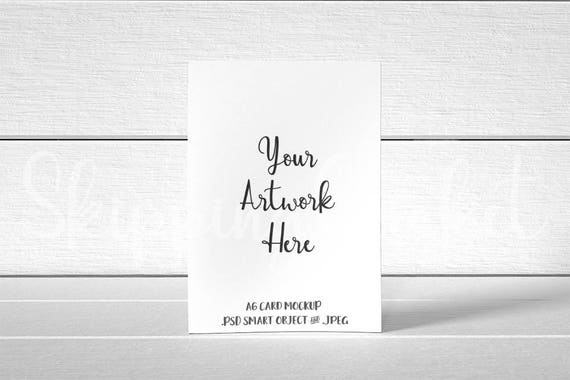 A6 Card Mockup On White Wooden Floorboards Card Stock